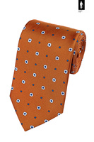 Pomarańczowy jedwabny krawat w geometryczno-kwiatowy wzór