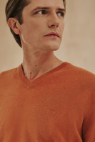 Pomarańczowy sweter męski V-neck bawełna