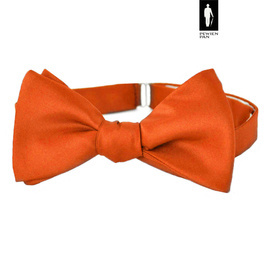 Mucha wiązana w odcieniu pomarańczowym