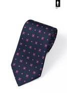 Granatowy krawat z drukowanego jedwabiu z różowym wzorem – włoski styl